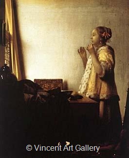 Woman with a Pearl Necklace by Johannes  Vermeer